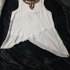 Asymmetrical sleeveless tunic